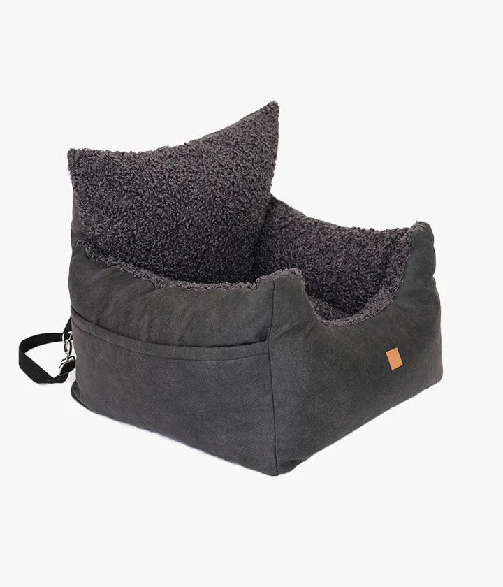 Side angle of the faux leather black dog car seat by Pet and Co