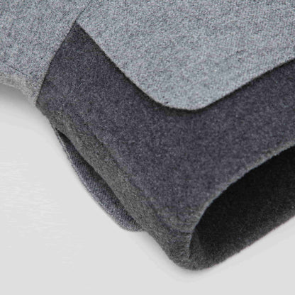 Detail close-up of the collar of a grey wintercoat for dogs
