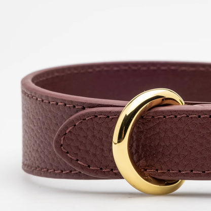 Close up of gold hardware on the Burgundy dog collar made from vegan leather