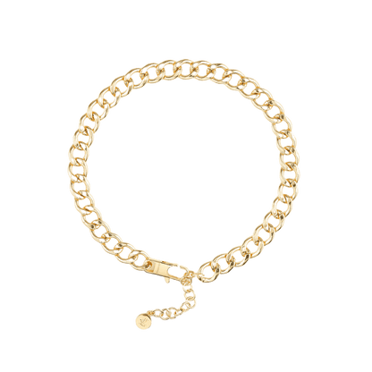 The Animals chunky gold curb chain necklace with adjustable clasp, shown on white background.
Die goldene The Animals Panzerkette mit verstellbarem Verschluss auf weißem Hintergrund.
Le collier gourmette doré The Animals avec fermoir réglable présenté sur fond blanc.